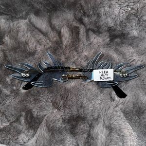 Unisex, transparent, light, blue, sunglasses shape of a flame. Brand new never